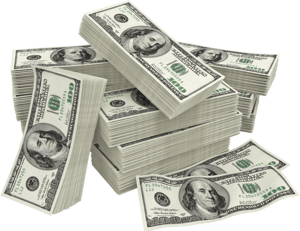 Large stacks of $100 U.S. dollar bills arranged in piles, with some lying flat and others stacked high, all featuring the portrait of Benjamin Franklin.