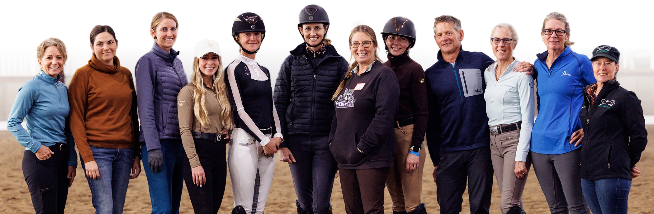 Amelia Newcomb with a group of students at an in person clinic.