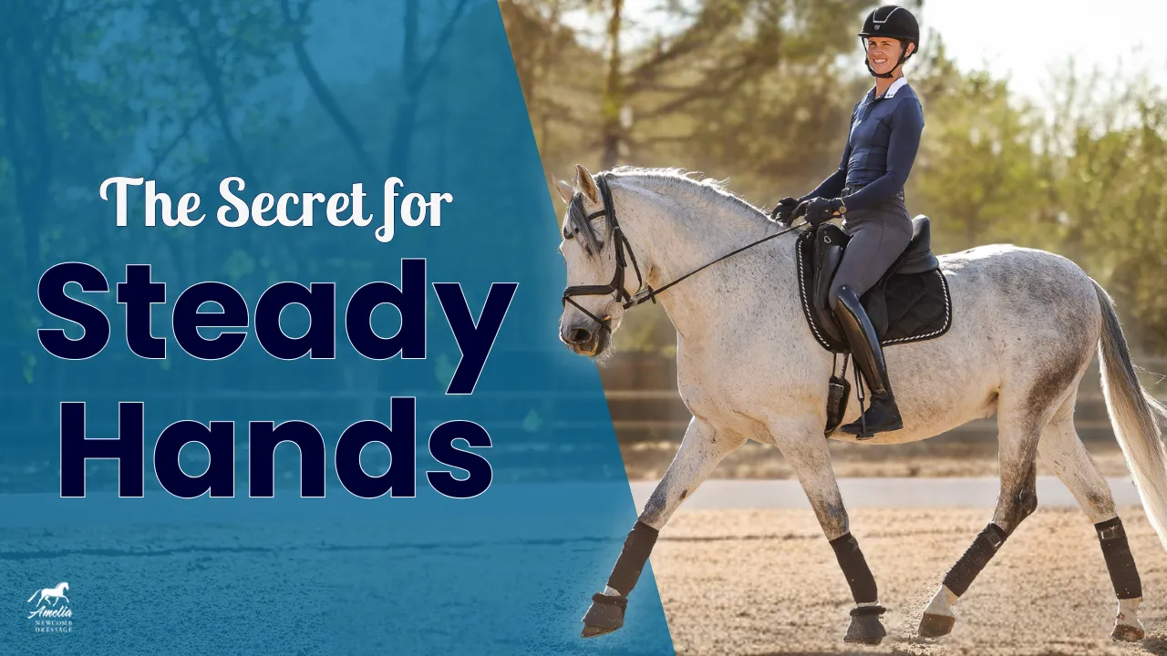 A rider in equestrian gear smiles while riding a gray horse in an outdoor arena, demonstrating the secret for steady hands. Trees and a fence are visible in the background as she maintains steady contact with her mount.